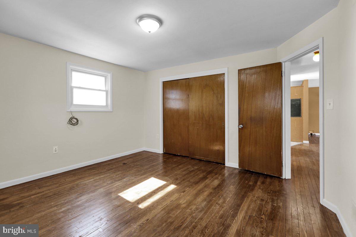 2326 Fairview Street Reading, PA 19609 - Photo 10 of 27 an empty room with wooden floor and windows