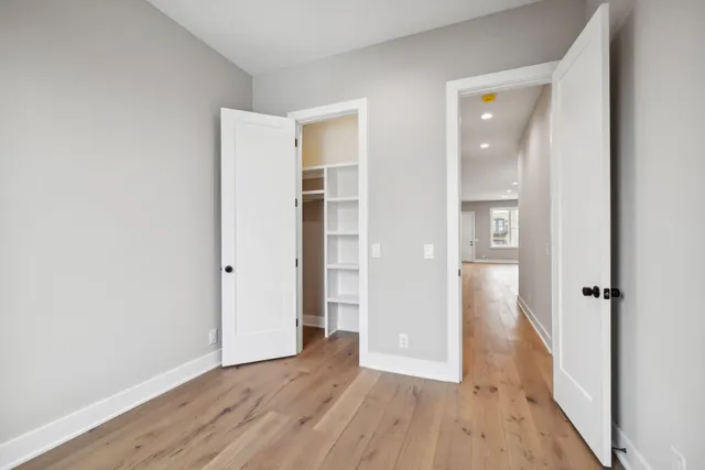a spacious bathroom with a double vanity sink mirror and double