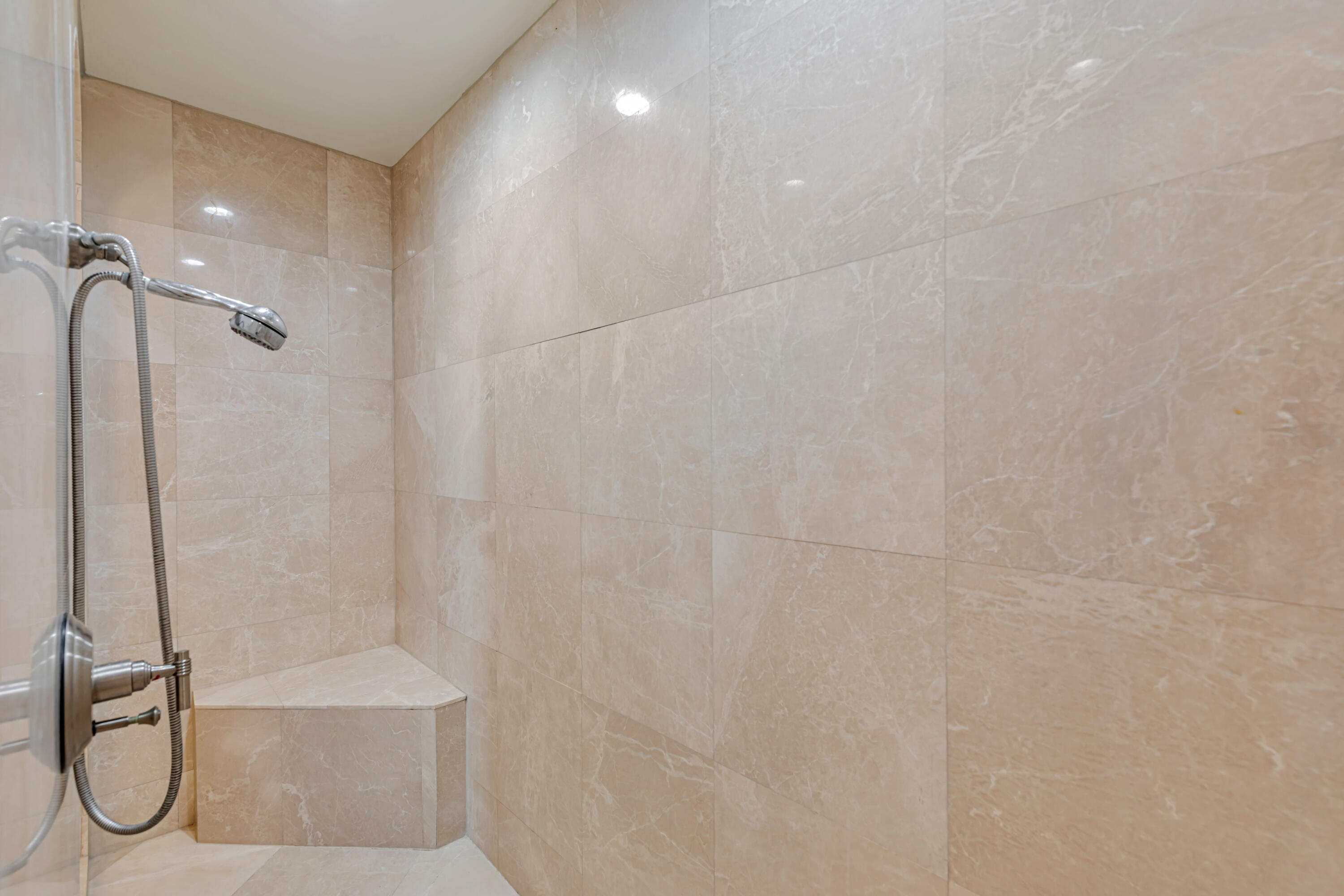 701 Southeast 21st Avenue, Unit 302 Deerfield Beach, FL 33441 - Photo 39 of 52 a bathroom with a shower