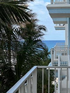 701 Southeast 21st Avenue, Unit 302 Deerfield Beach, FL 33441 - Photo 6 of 52 a view of balcony with two plants