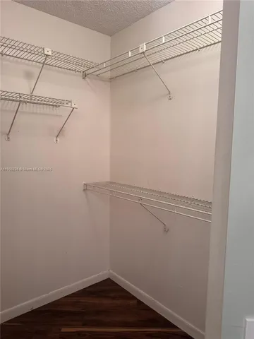 a view of a room with racks on the wall