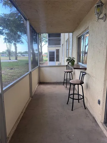 a view of work space with furniture and a yard