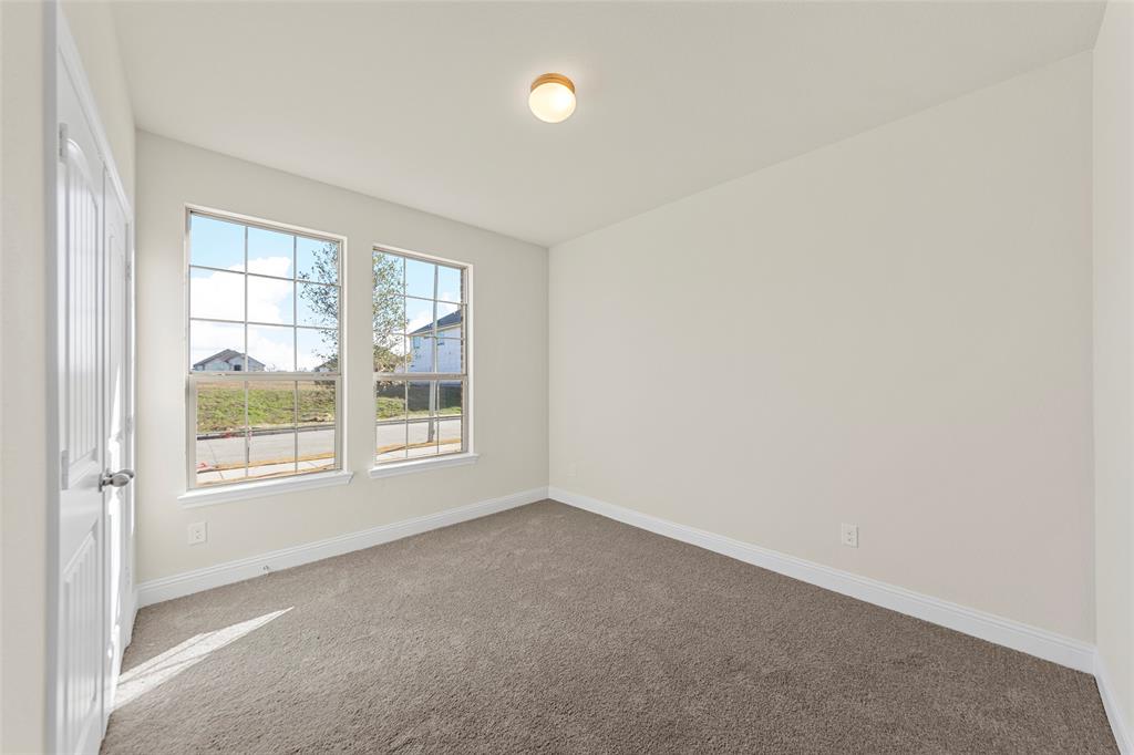 1529 Addison Lane Lancaster, TX 75134 - Photo 28 of 35 an empty room with windows