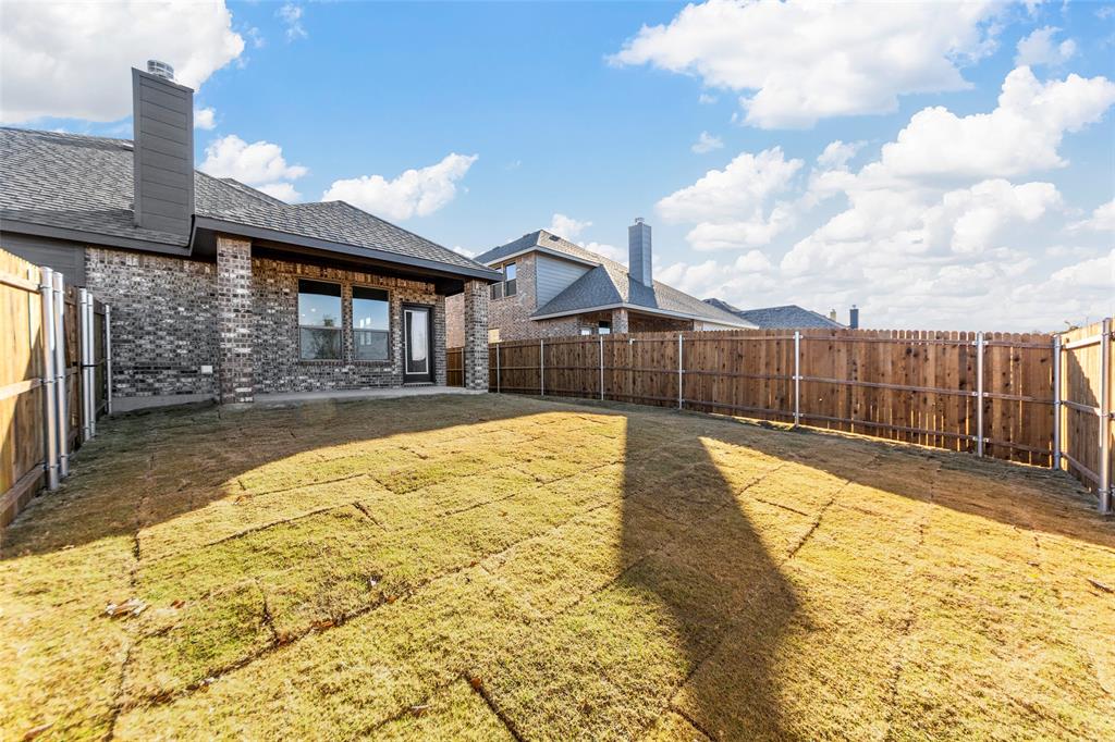 1529 Addison Lane Lancaster, TX 75134 - Photo 6 of 35 a swimming pool with yard in front of it