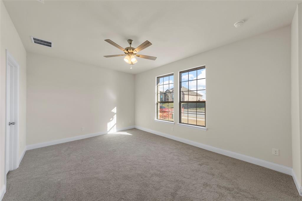 1529 Addison Lane Lancaster, TX 75134 - Photo 7 of 35 a view of an empty room with a window