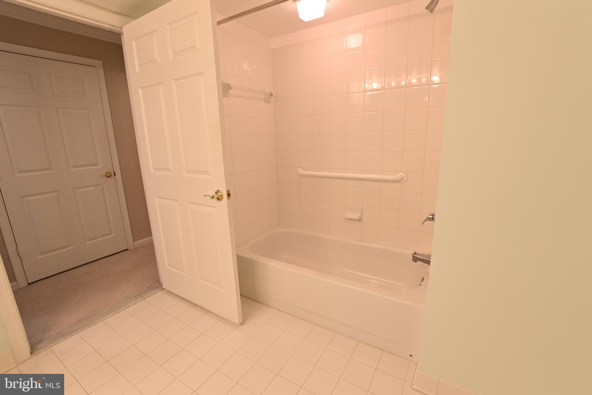 12300 Rosslare Ridge Road, Unit 301 Lutherville-Timonium, MD 21093 - Photo 24 of 25 Separate tub in hall bath