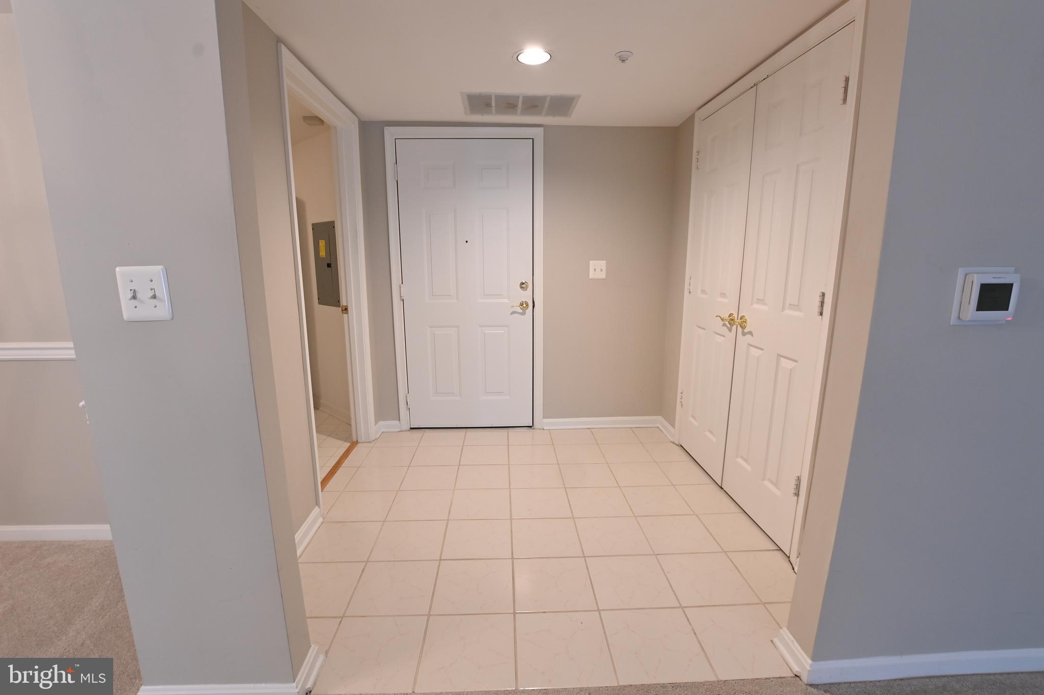 12300 Rosslare Ridge Road, Unit 301 Lutherville-Timonium, MD 21093 - Photo 5 of 25 Entrance foyer into the unit