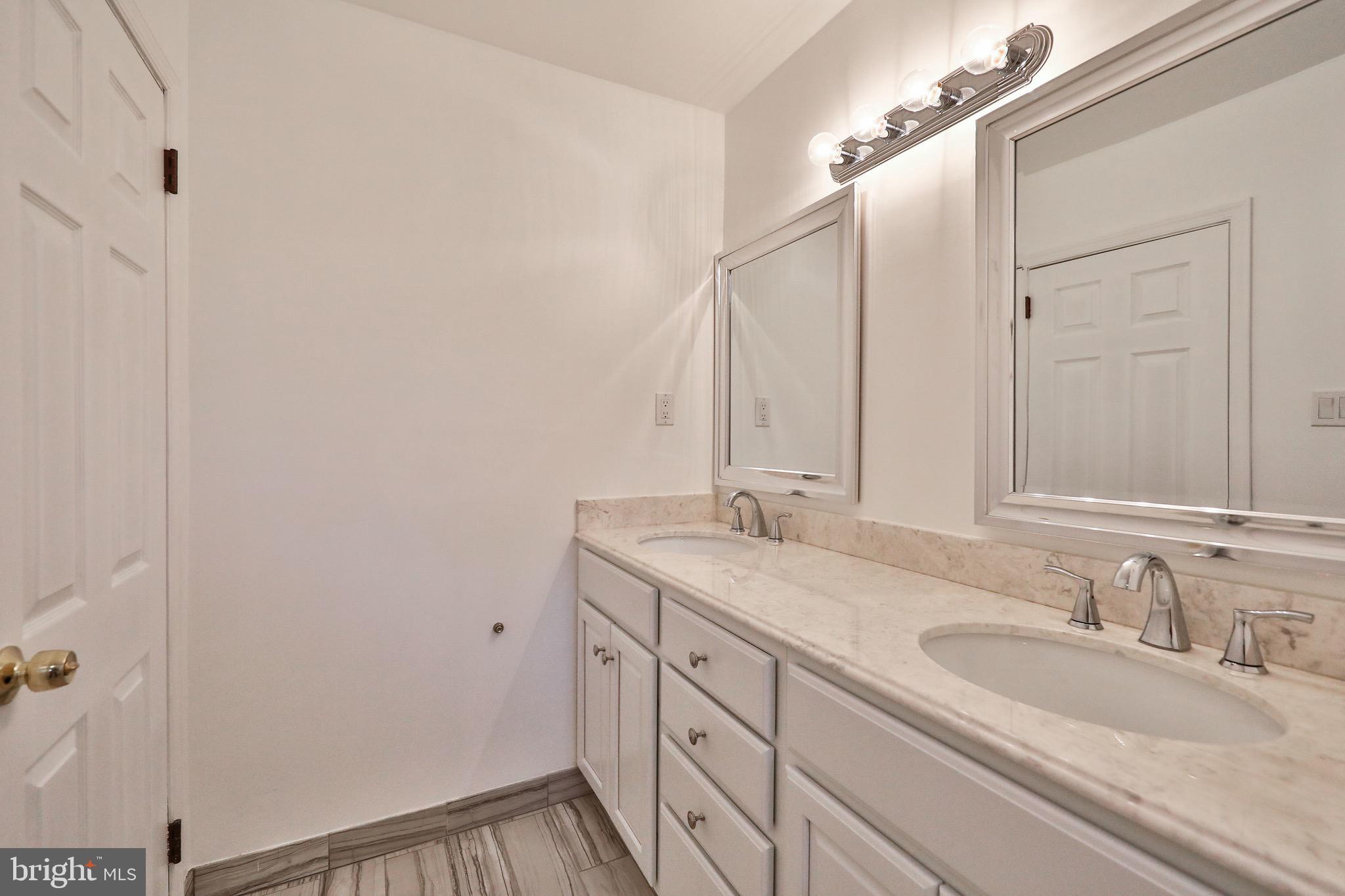 1004 Devon Road Rydal, PA 19046 - Photo 28 of 44 Hall Bathroom
