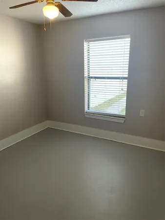 an empty room with a window