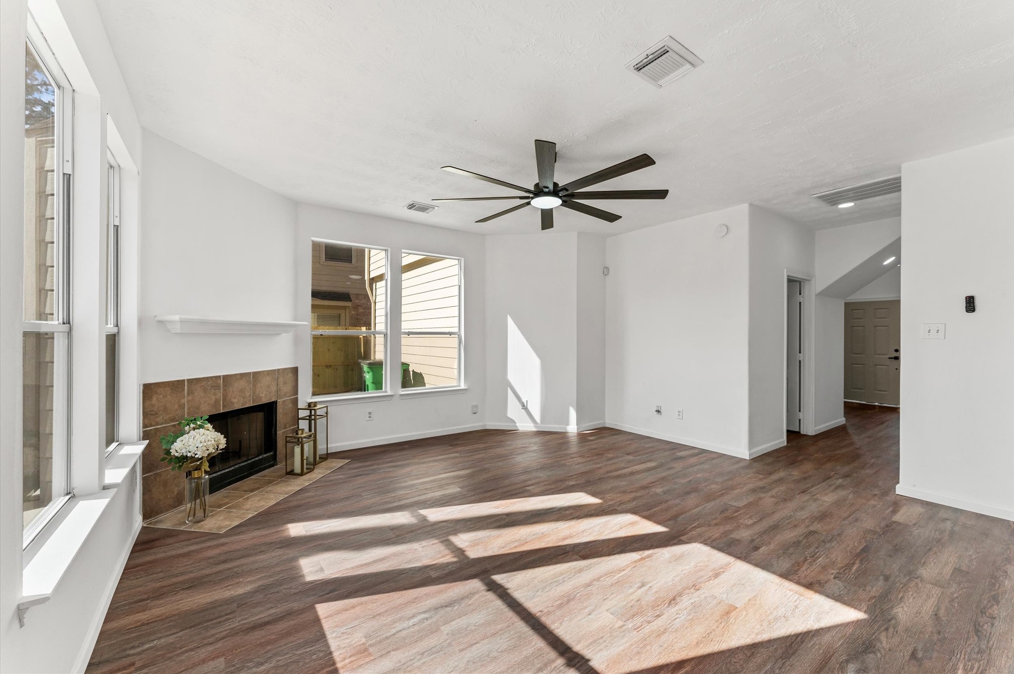 2830 Fern Hill Drive Spring, TX 77373 - Photo 15 of 39 a view of livingroom with hardwood floor and a fireplace