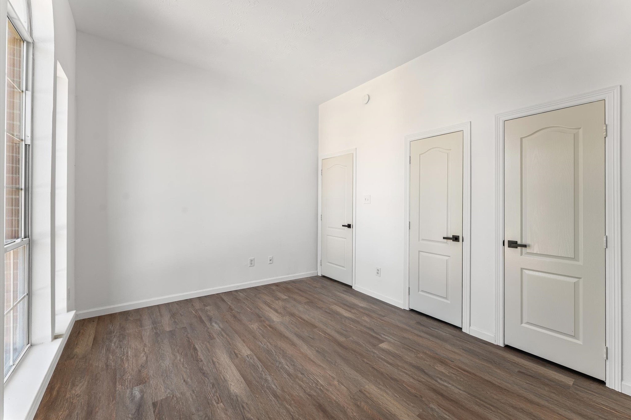 2830 Fern Hill Drive Spring, TX 77373 - Photo 33 of 39 a view of an empty room with wooden floor