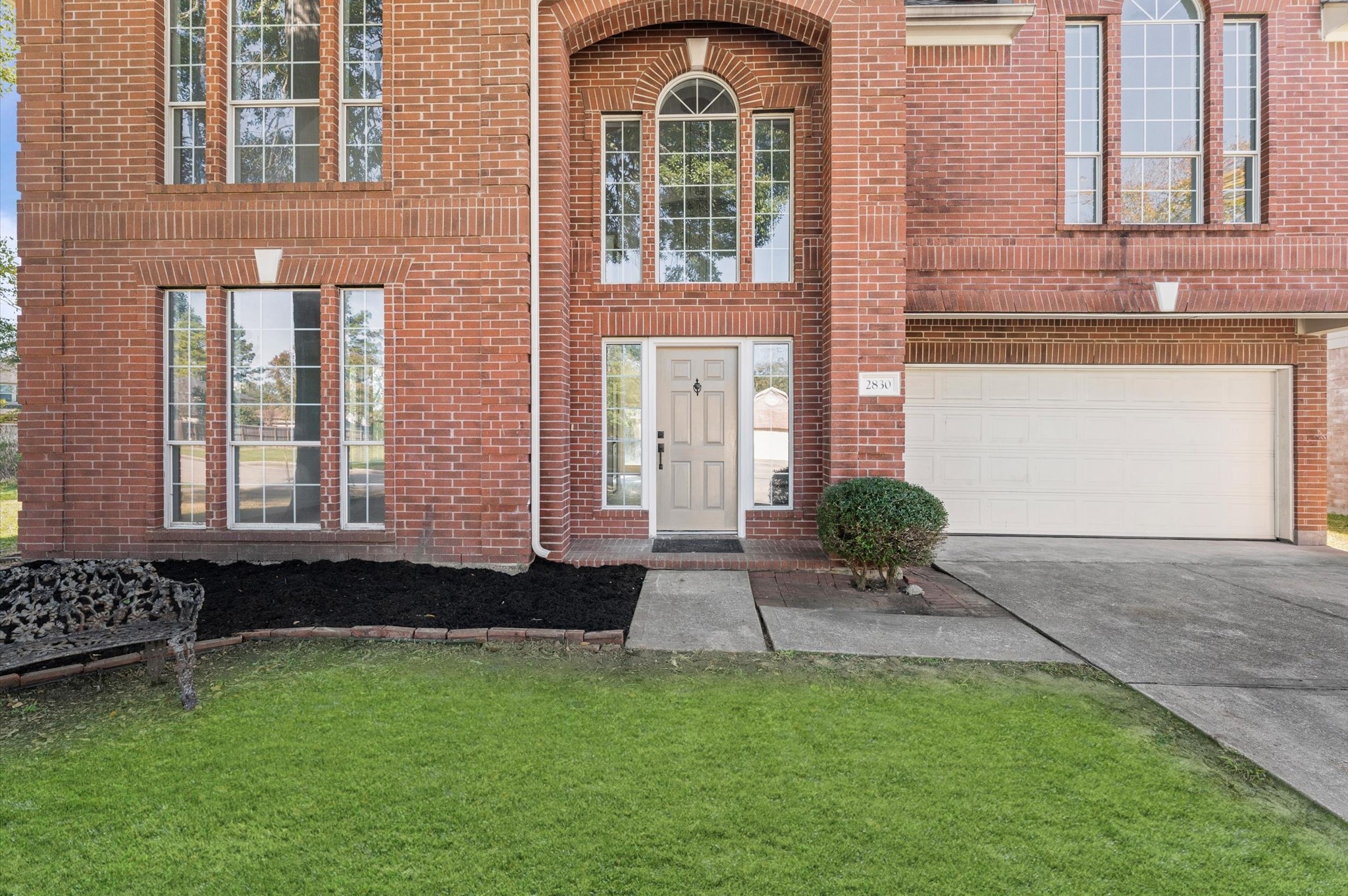 2830 Fern Hill Drive Spring, TX 77373 - Photo 6 of 39 a front view of a house with a garden