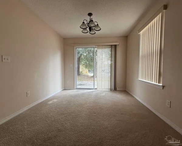 an empty room that has a window