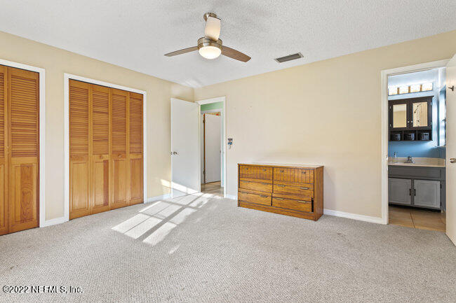 361 Shamrock Road St. Augustine, FL 32086 - Photo 18 of 30 a view of an empty room with a window