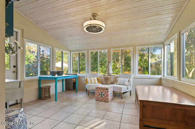 361 Shamrock Road St. Augustine, FL 32086 - Photo 20 of 30 a living room with a large window