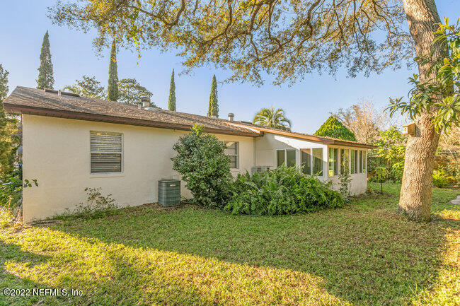 361 Shamrock Road St. Augustine, FL 32086 - Photo 27 of 30 a front view of house with garden