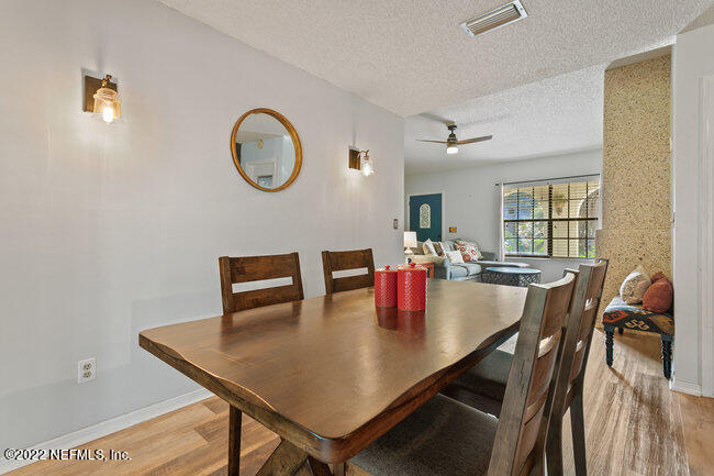 361 Shamrock Road St. Augustine, FL 32086 - Photo 9 of 30 a view of a dining room with furniture