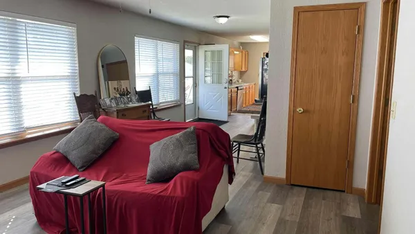 a bed room with a bed and a window