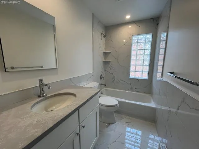 a view of room with wooden floor