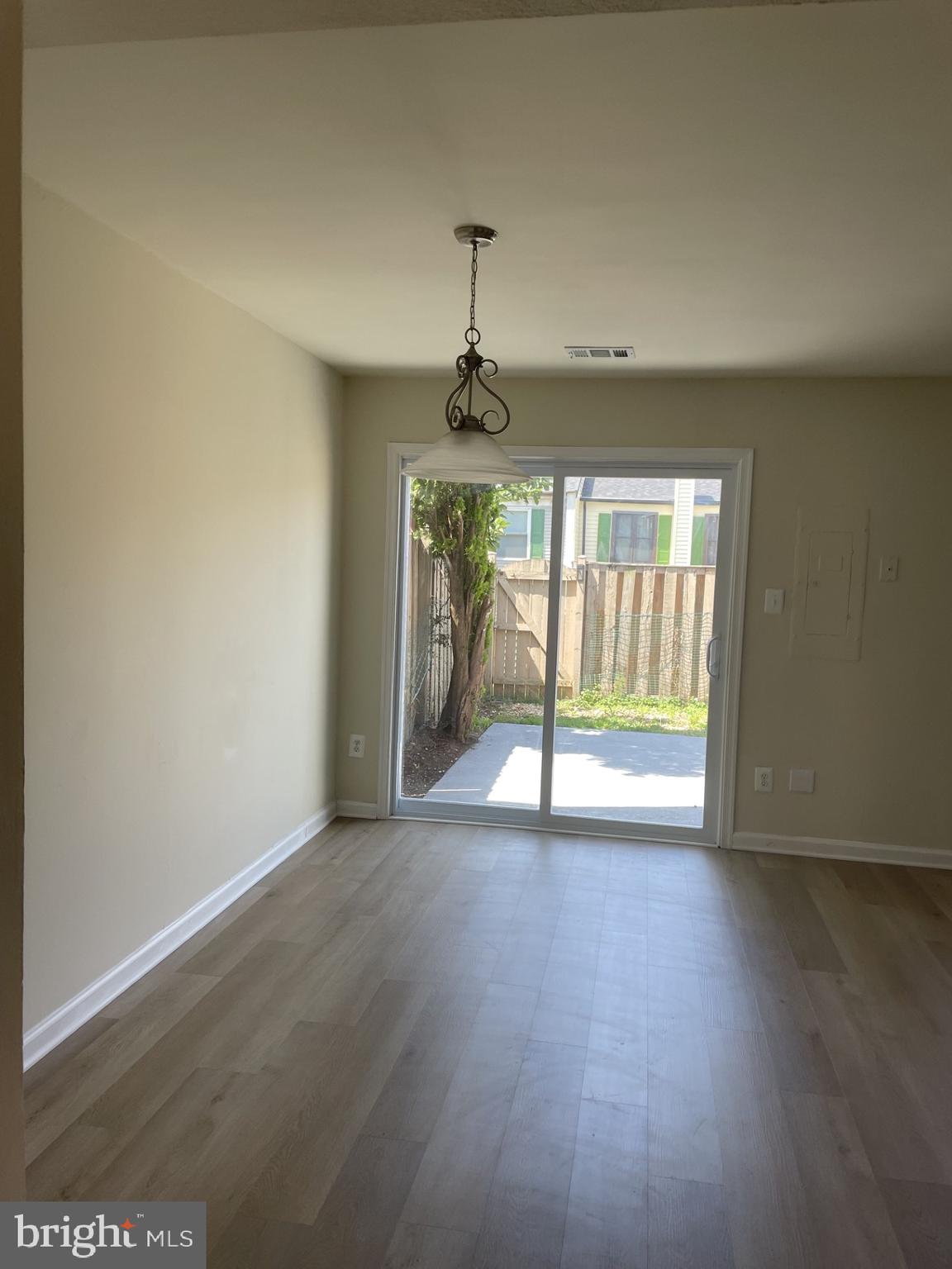 1287 Springtide Place Herndon, VA 20170 - Photo 18 of 23 a view of an empty room with a window