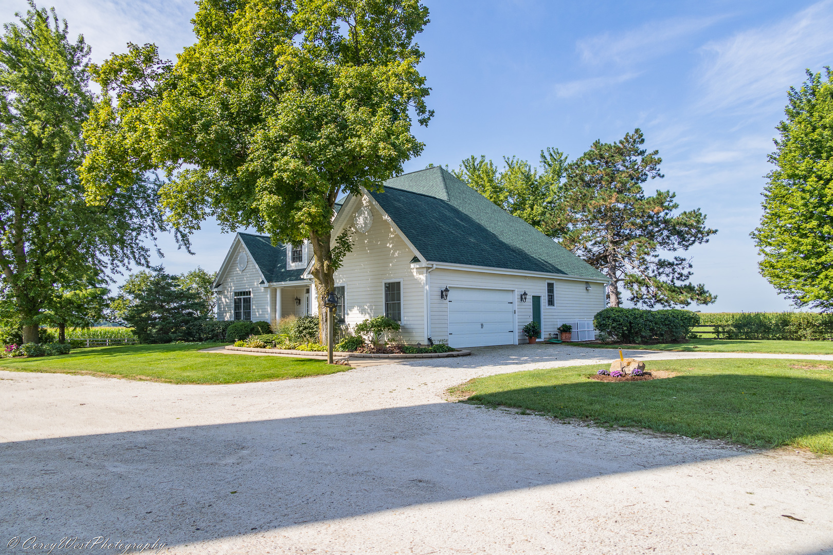 N307 Watson Road Maple Park, IL 60151 - Photo 38 of 65 a front view of a house with a yard and garage