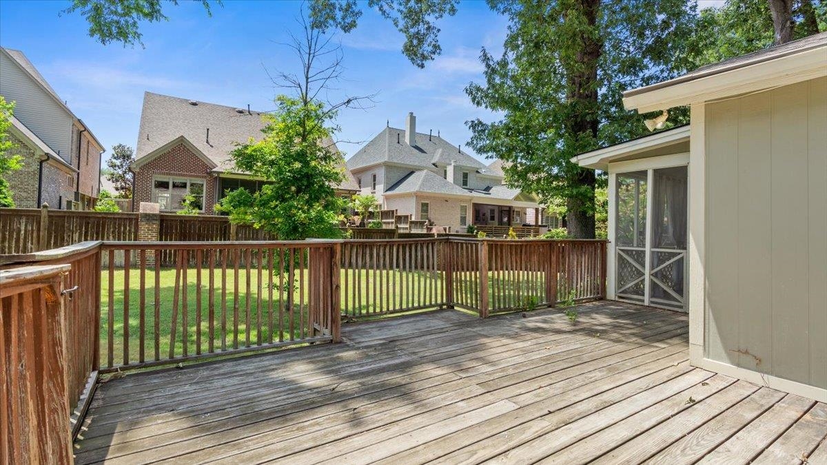 1707 Falling Leaf Road Germantown, TN 38138 - Photo 32 of 38 Wooden deck with a lawn