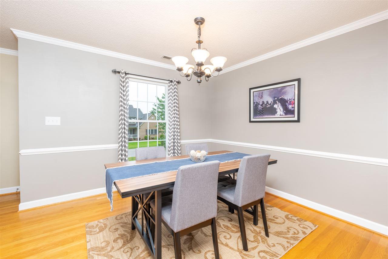 65 Long Bow Road Waynesboro, VA 22980 - Photo 33 of 50 a view of a dining room with furniture wooden floor and a chandelier