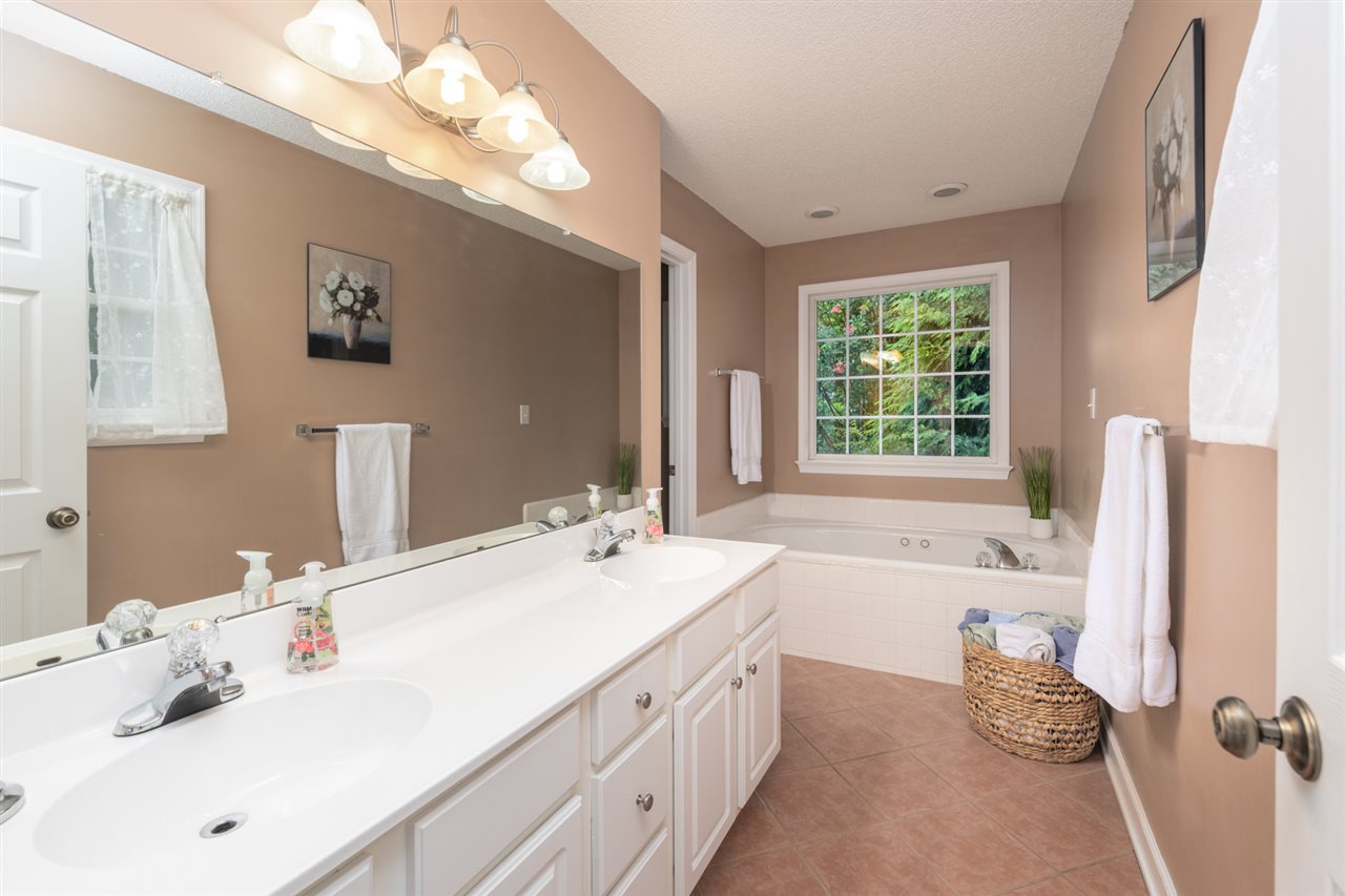 65 Long Bow Road Waynesboro, VA 22980 - Photo 41 of 50 a bathroom with a double vanity sink mirror and double
