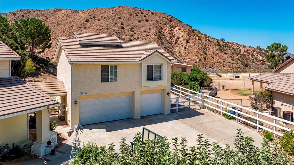 32201 Joaquin Road Acton, CA 93510 - Photo 11 of 75 a view of a house with a backyard