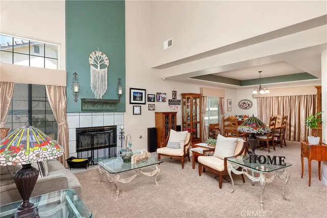 a kitchen with stainless steel appliances granite countertop a stove and a wooden floors