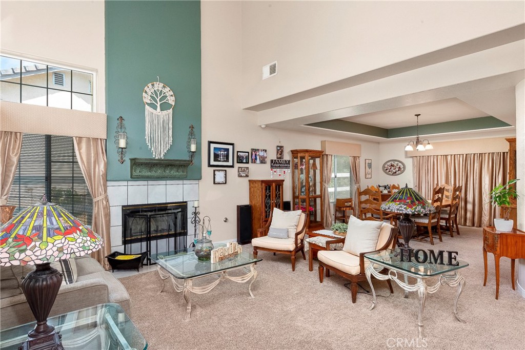 32201 Joaquin Road Acton, CA 93510 - Photo 17 of 75 a living room with furniture and a fireplace