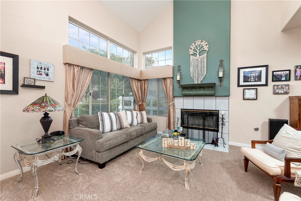 32201 Joaquin Road Acton, CA 93510 - Photo 18 of 75 a living room with furniture and a fireplace