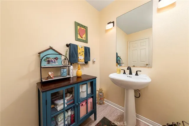 a view of walk in closet with clothes