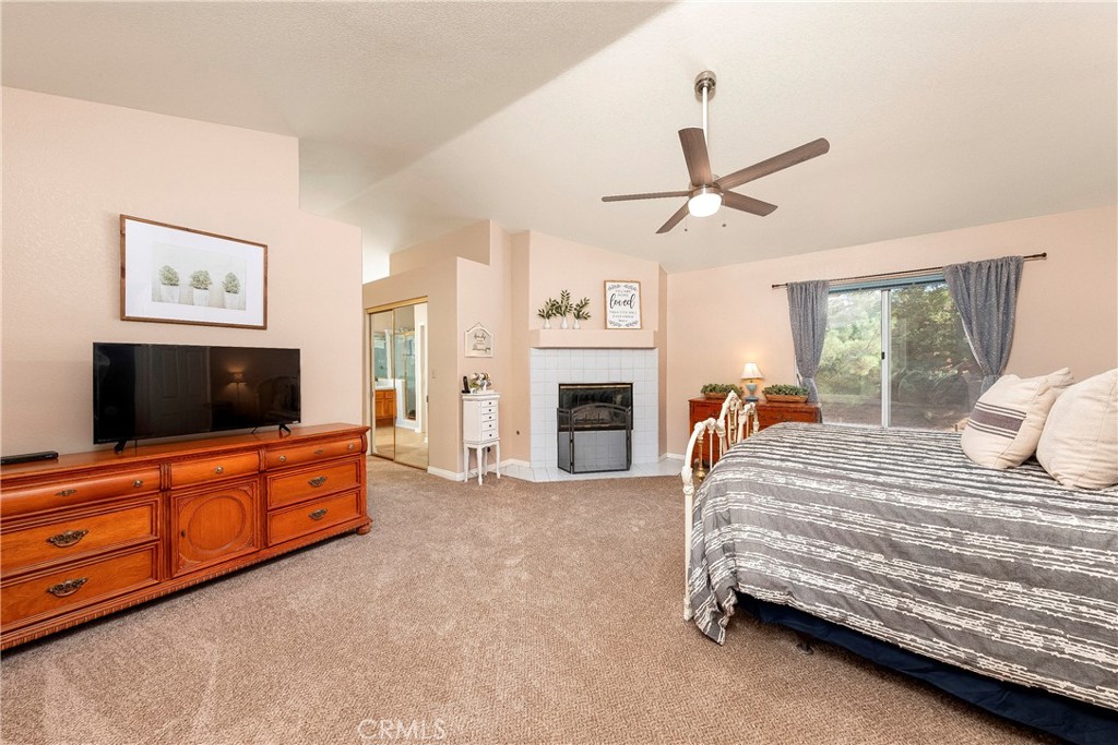 32201 Joaquin Road Acton, CA 93510 - Photo 33 of 75 a bedroom with a bed and a flat screen tv