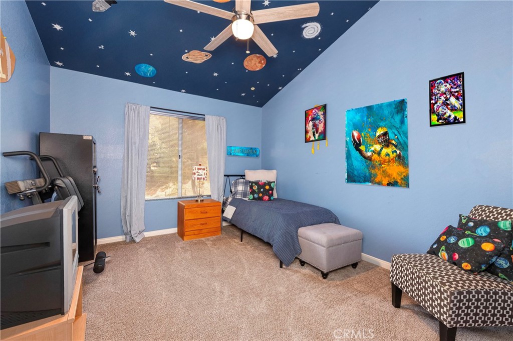 32201 Joaquin Road Acton, CA 93510 - Photo 39 of 75 a bedroom with furniture and a window