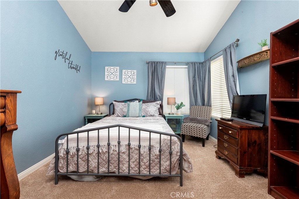 32201 Joaquin Road Acton, CA 93510 - Photo 41 of 75 a bedroom with a bed and a flat screen tv