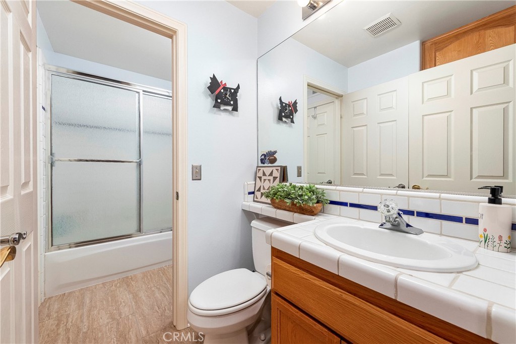 32201 Joaquin Road Acton, CA 93510 - Photo 42 of 75 a bathroom with a sink toilet and shower