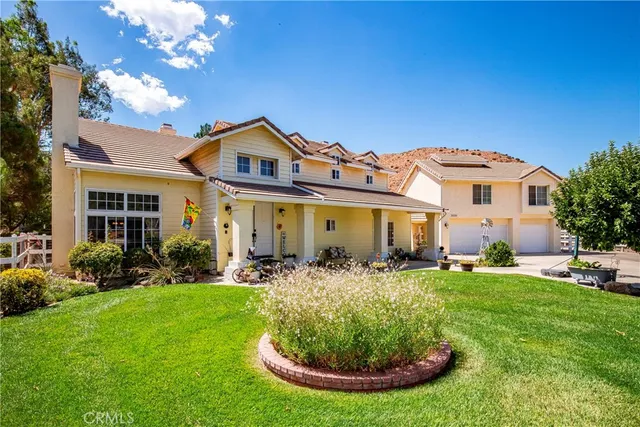 a front view of a house with a outdoor space