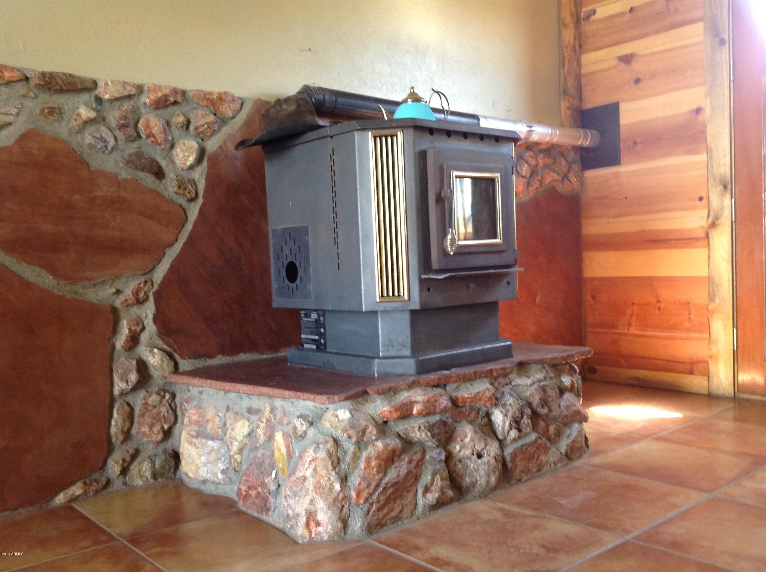 7342 North College Peak Road Douglas, AZ 85607 - Photo 14 of 71 Raised pellet stove