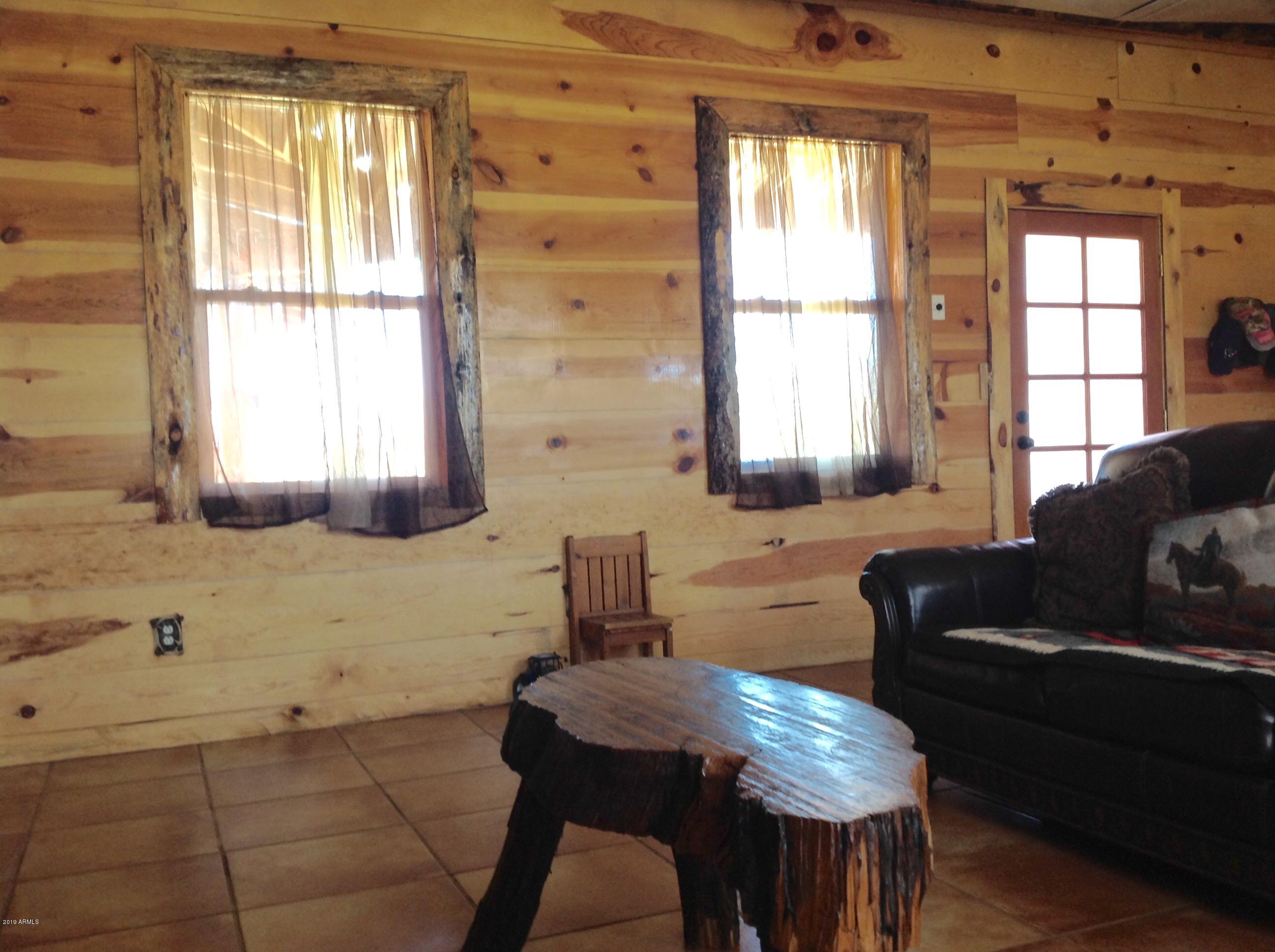 7342 North College Peak Road Douglas, AZ 85607 - Photo 17 of 71 Log cabin style interior