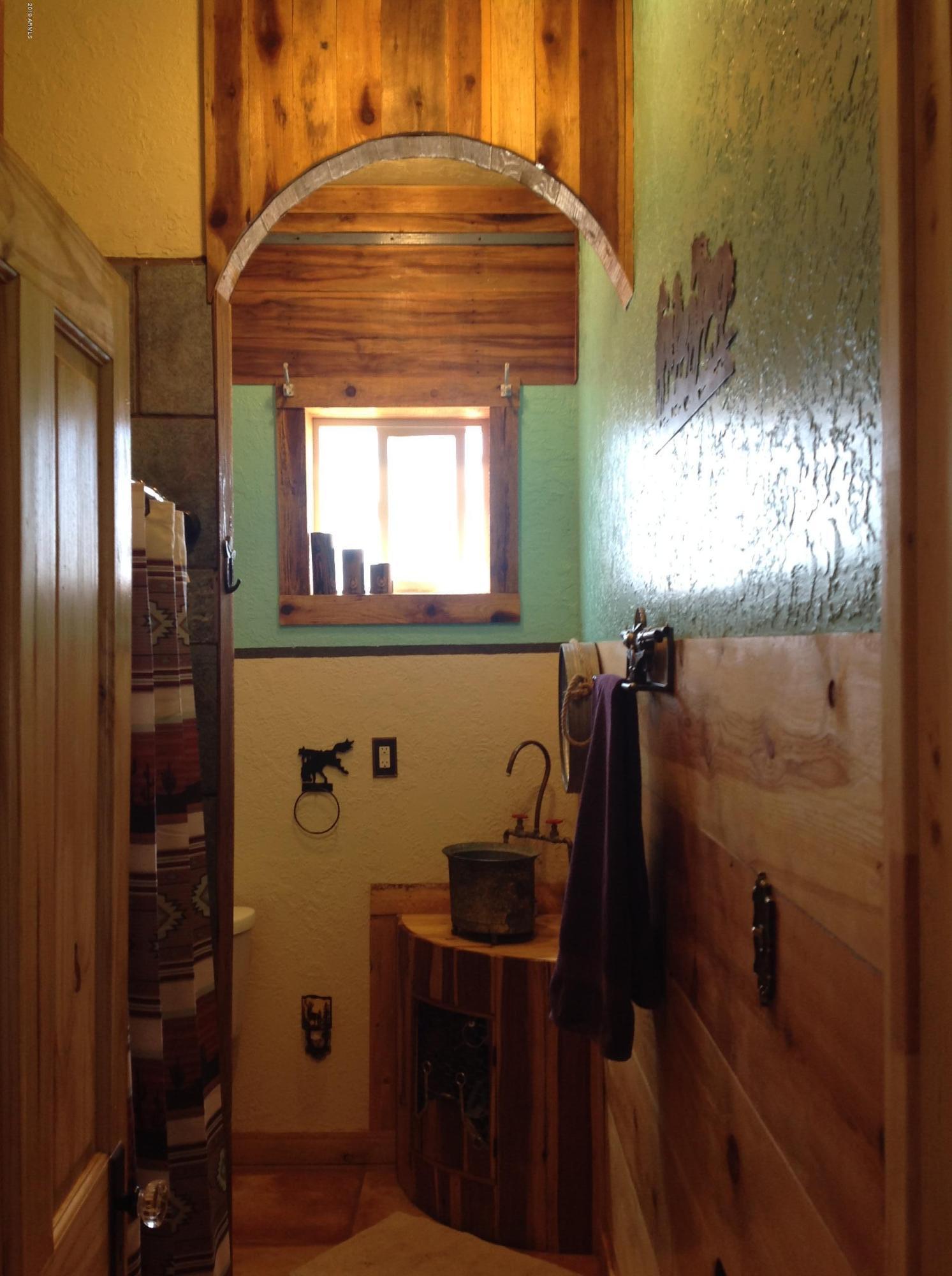 7342 North College Peak Road Douglas, AZ 85607 - Photo 21 of 71 hall bath cedar trim