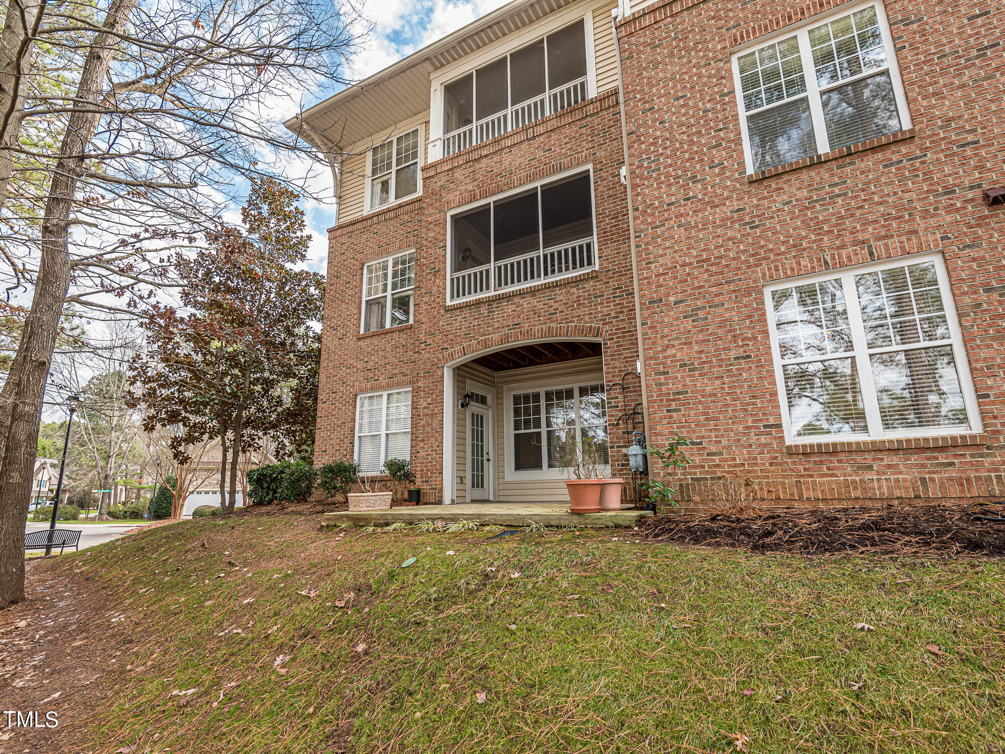 8041 Allyns Landing Way, Unit 103 Raleigh, NC 27615 - Photo 25 of 33 a front view of a house with a yard