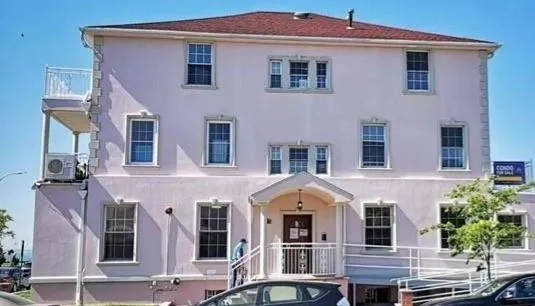 a front view of a house with balcony