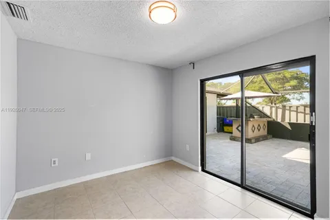 a view of bathroom with a glass shower door