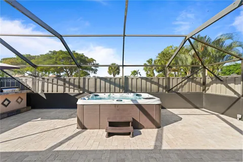 a large kitchen with stainless steel appliances a counter top space cabinets and stainless steel appliances