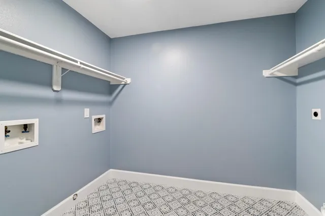 a view of small space with wooden floor and a ceiling fan