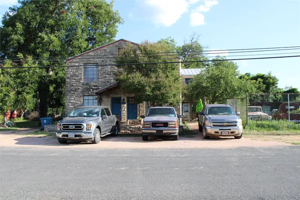 a car parked in front of a house