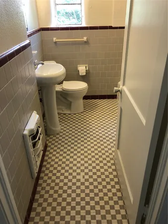 a bathroom with a sink and a toilet