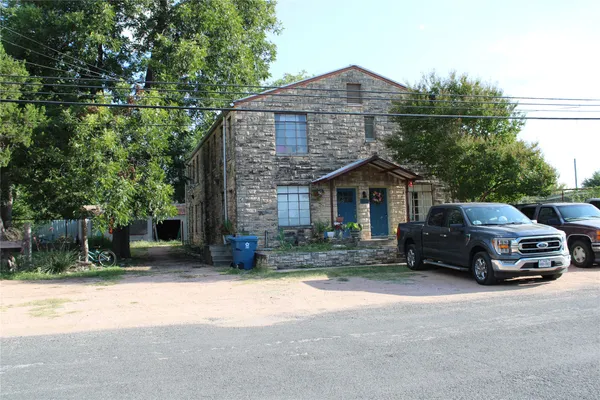 a car parked in front of a house