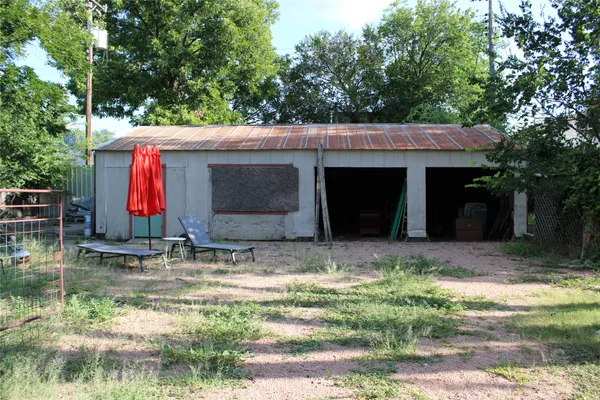 a view of outdoor space yard and garage